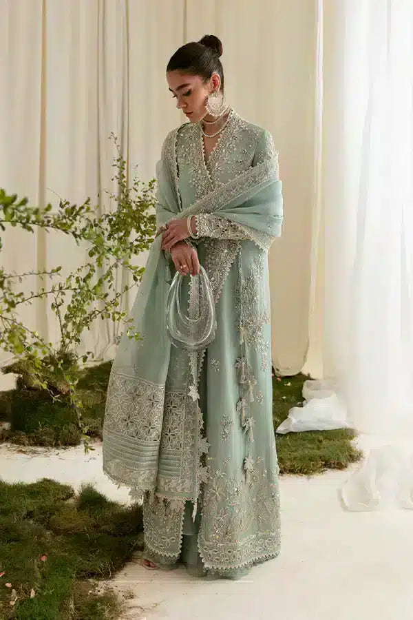 A sky blue gown with it's unique style introduced by Suffuse by Sana Yasir | Freeshia Formals 23 | Ilana - Saira Saqlain