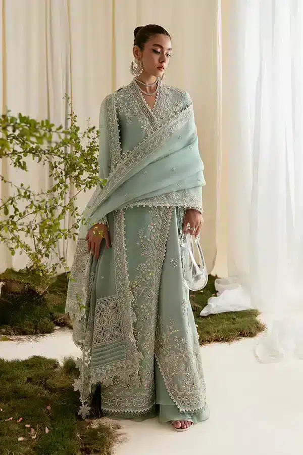 A sky blue gown with it's unique style introduced by Suffuse by Sana Yasir | Freeshia Formals 23 | Ilana - Saira Saqlain